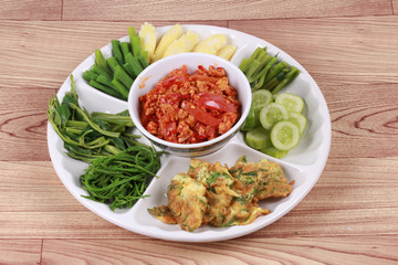 Spicy meat and tomato dip call Nam Prik Ong.