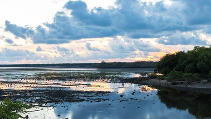 Tropical Sunset on the lake on Bali island, Indonesia.