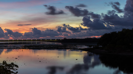 Fototapeta na wymiar Tropical Sunset on the lake on Bali island, Indonesia.