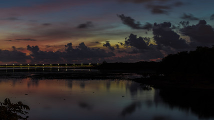 Obraz premium Tropical Sunset on the lake on Bali island, Indonesia.