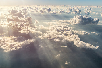 Blue sky and Clouds as seen through window of aircraft