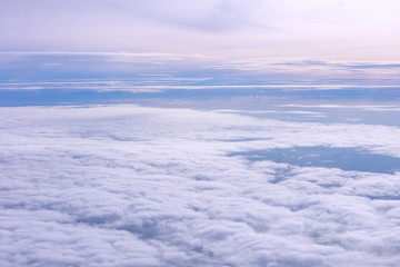 Obraz premium Blue sky and Clouds as seen through window of aircraft