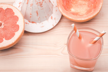 fresh citrus juice in a glass top view/fresh juice of grapefruit in a glass top view