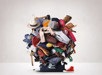 Fotobehang Big heap of different clothes and shoes © Zarya Maxim