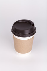 Take-out coffee with cup holder on white background