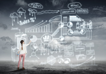 Girl sketching infographs