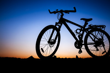 Fototapeta na wymiar The silhouette of mountain bike