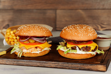 Two cheeseburgers in the decoration closeup shot