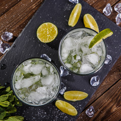 Two glasses of ice, lemon