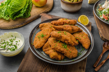 Breaded original schnitzel with waldorf salad