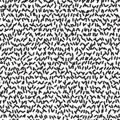 Memphis design. Organic abstract seamless pattern. Fashion black dash on a white background. Trend of the 80s, 90s. Modern print. Funky background.