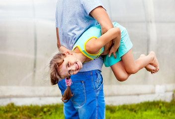 Small Girl with Father