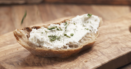 herbs on rustic bread with ricotta cheese, 4k photo