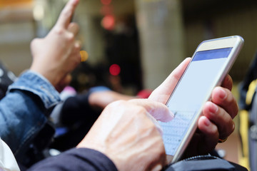Group of people using mobile devices