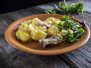 Pork ribs baked with potatoes