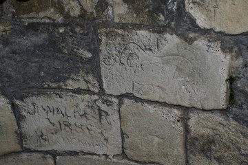 Ancient graffiti Portchester Castle Portsmouth Harbour Hampshire UK