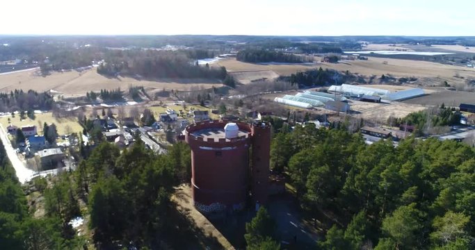 Halikko watertower, Cinema 4k circuling aerial view of Halikko water tower, in Salo, Finland