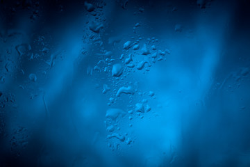Drops of rain on glass