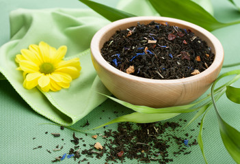 Dry black tea in bowl
