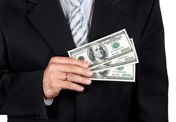 Businessman holding dollar banknotes in his hand, isolated