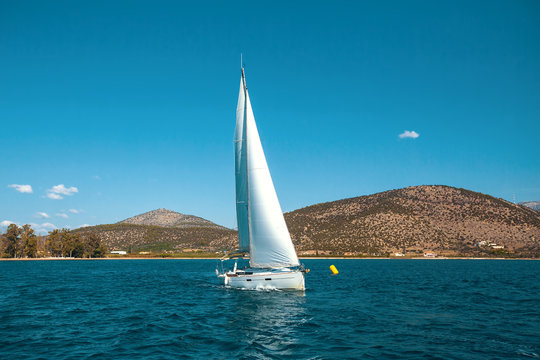 Sailboat in the sea. Сruise sailing.