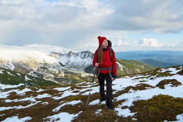 Obraz premium Dreamy blonde girl walking with great sport backpack.