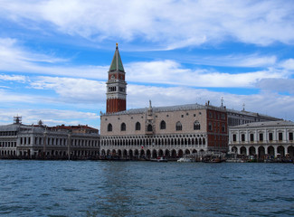 Fototapeta na wymiar Venice san marco palace from the sea with clouds and blue sky