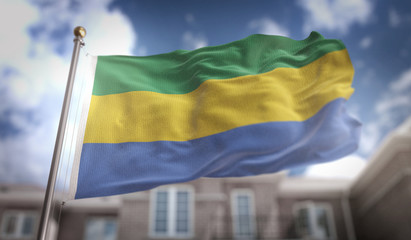 Fototapeta na wymiar Gabon Flag 3D Rendering on Blue Sky Building Background