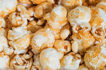 Food background of grains of popcorn macro - selective focus