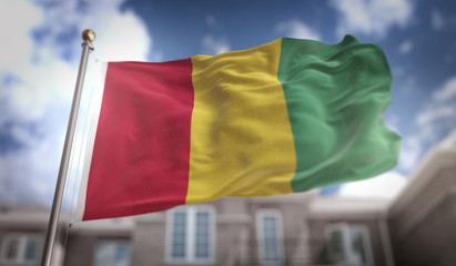 Fototapeta na wymiar Guinea Flag 3D Rendering on Blue Sky Building Background