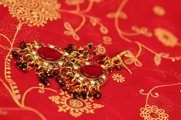 Indian jewelry earrings red sari
