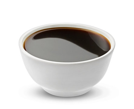 Soy sauce in bowl isolated on white background, with clipping path, one of the collection of various sauces