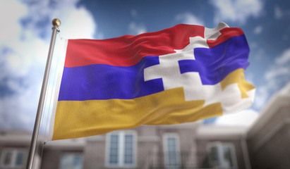 Fototapeta na wymiar Nagorno-Karabakh Republic Flag 3D Rendering on Blue Sky Building Background