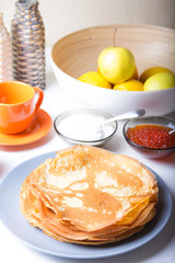Traditional Russian pancakes with caviar and sour cream. Maslennitsa. Selective focus