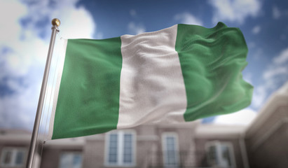 Fototapeta na wymiar Nigeria Flag 3D Rendering on Blue Sky Building Background