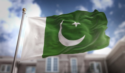 Fototapeta na wymiar Pakistan Flag 3D Rendering on Blue Sky Building Background