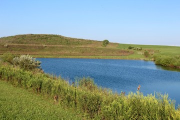 The lake and the surrounding landscape.