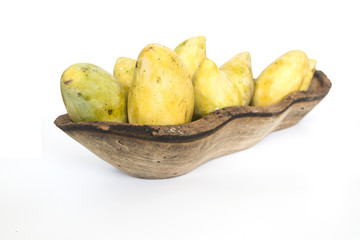 many ripe mango in wood bow