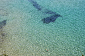 Snorkeling in a blue sea 