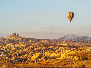 Hot air balloons flying over the mountain in Cappadocia Goreme National Park Turkey
