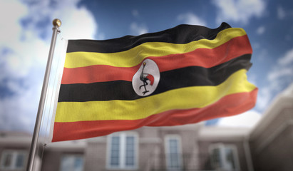 Uganda Flag 3D Rendering on Blue Sky Building Background