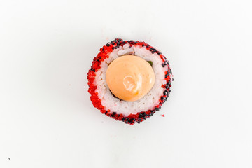 Japanese cuisine. One peace of sushi roll isolated on white background