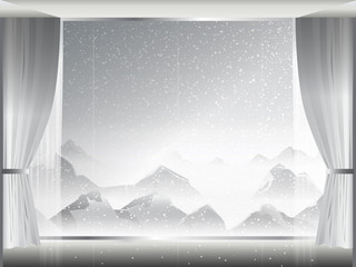 view of snowstorm and mist on mountain in room with large window