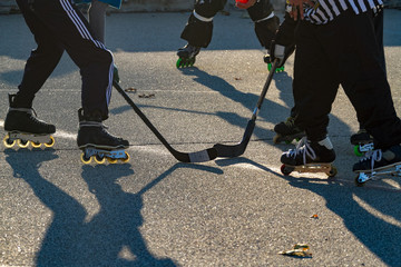 three playes and one ref waiting for puck drop