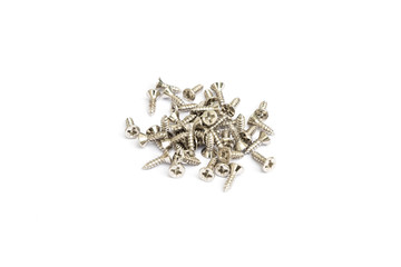 close up group of Many silver screws on white background