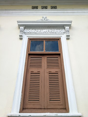 Sino-Portuguese Architecture building, This architectural style is European mixed with Chinese modern. Aged wooden window in classic design, vintage stlye.