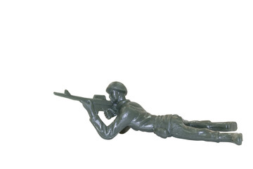 Miniature toy soldier on white background