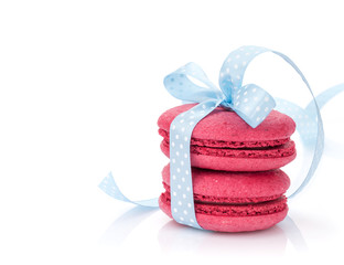 Red macarons with blue ribbon