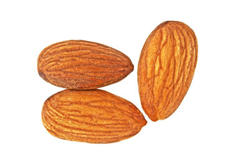 Three almond nuts isolated on a white background, top view