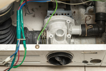 Repair old laundry washer. Filter-cap of the pump.